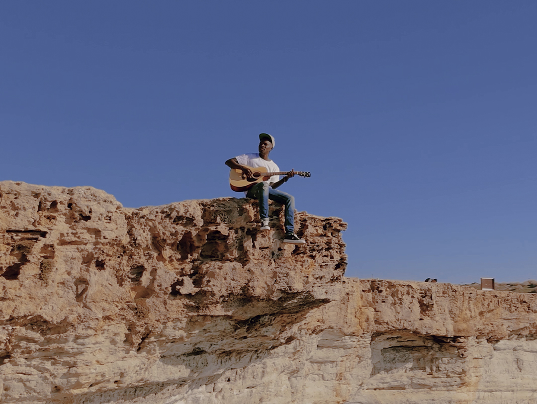 Armel Ndahiro at Ayia Napa Sea Caves. Images from the cover song(No woman, No cry-Bob Marley)